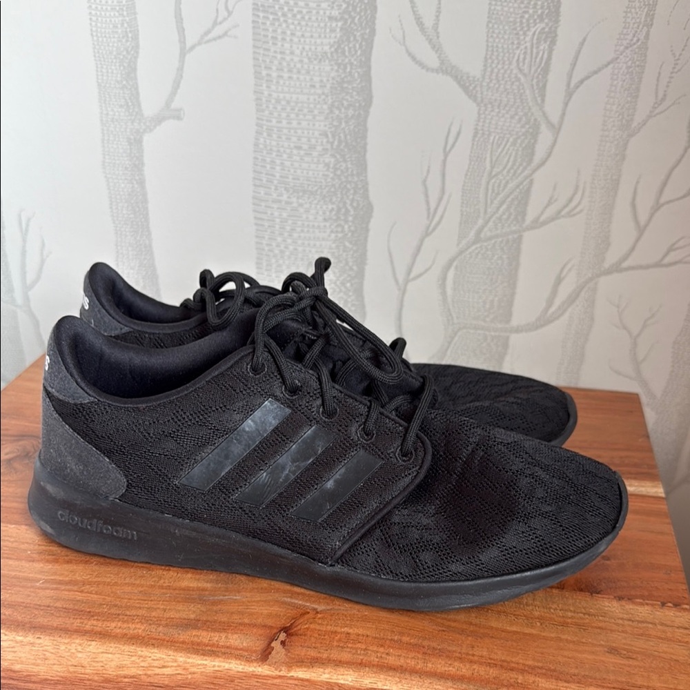 Adidas Black Sneakers with Mesh Upper and Sleek Design